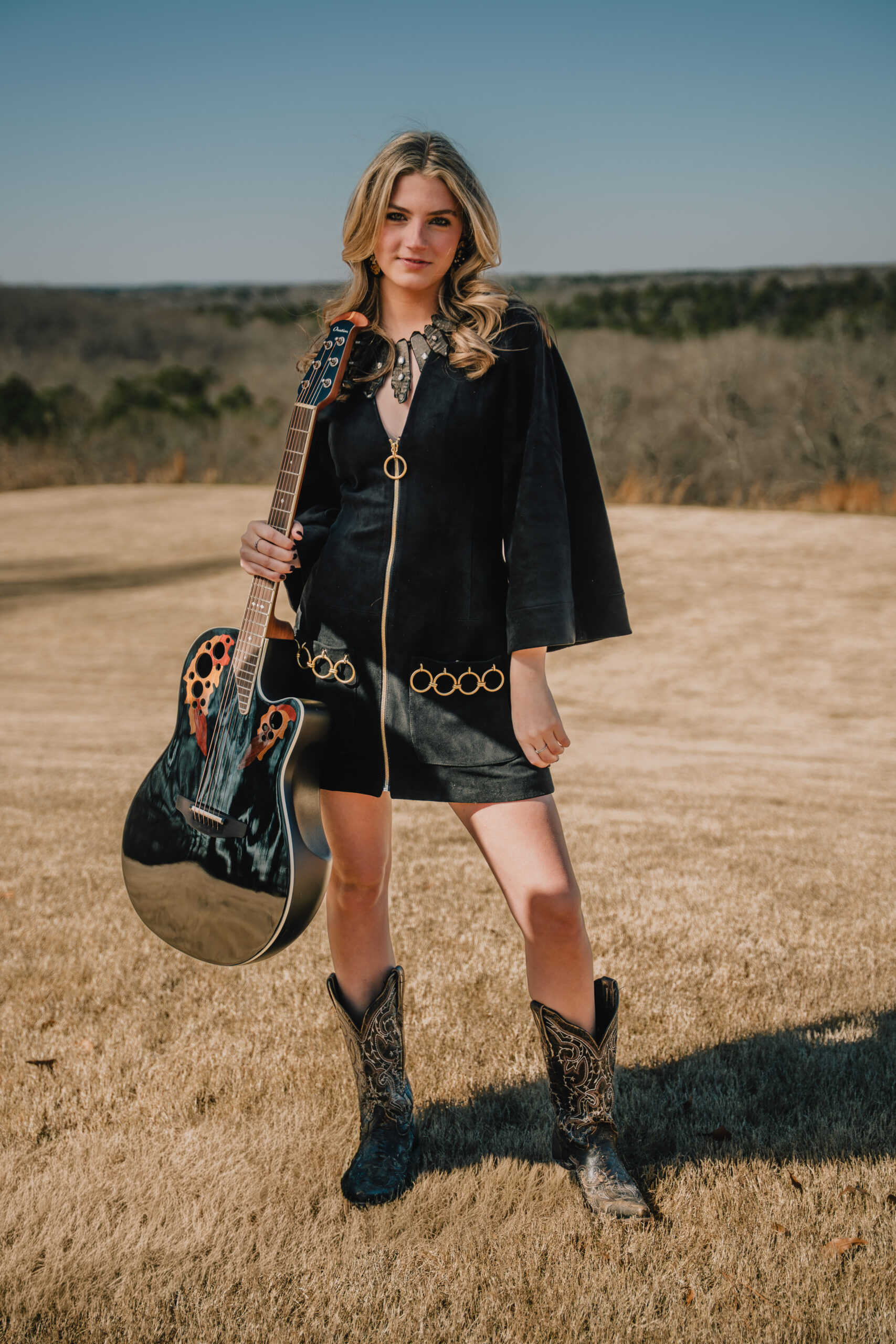 Ellie Jarrell outdoors with Ovation guitar