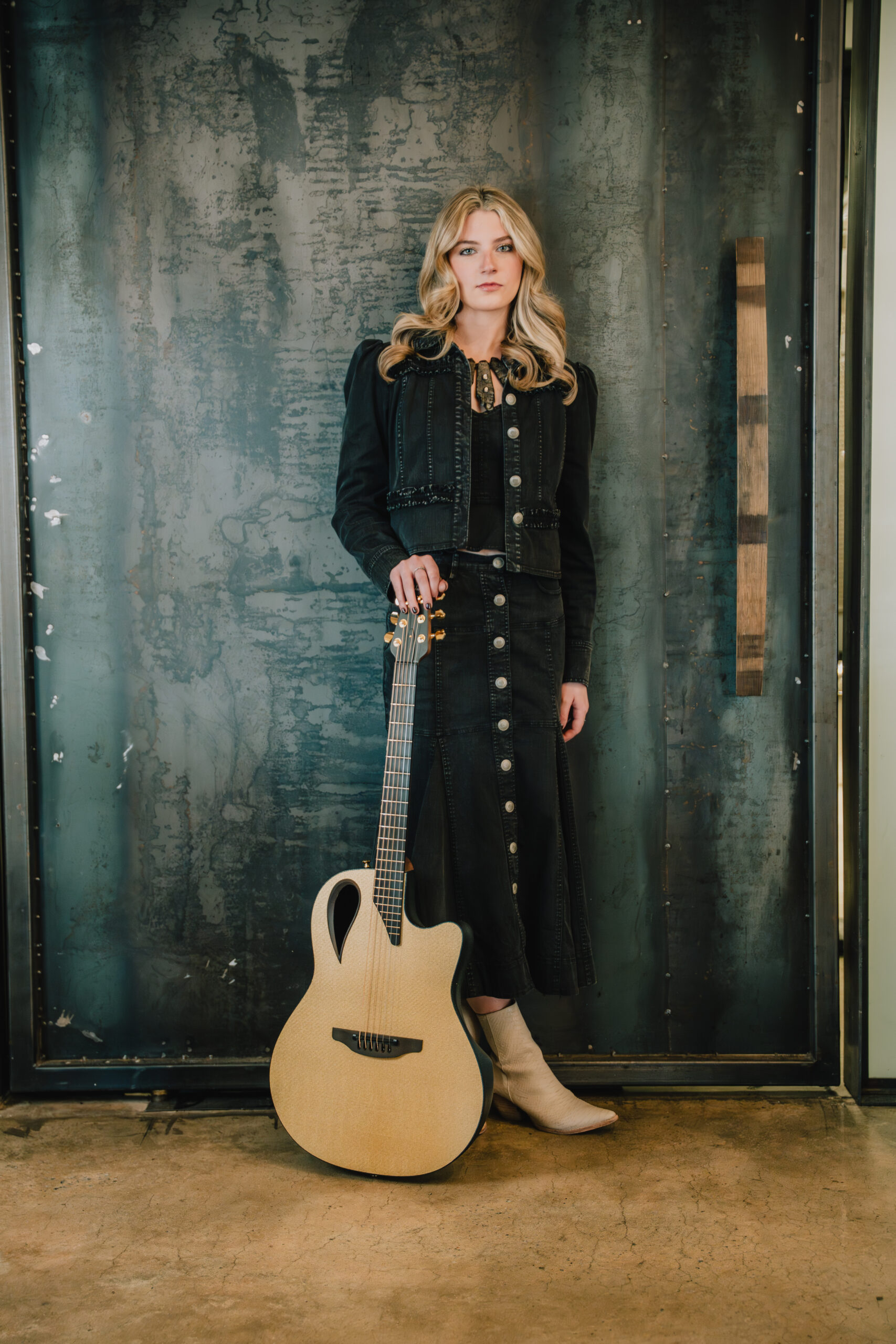 Ellie Jarrell editorial portrait with guitar